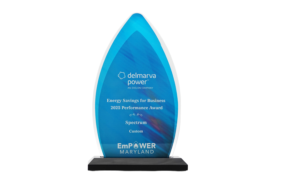 Blue glass award for "Energy Savings for Business 2025 Performance Award" by Delmarva Power, EmPOWER Maryland.